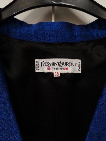 YVES SAINT LAURENT
Blue three-piece suit
Dress,...
