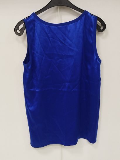 YVES SAINT LAURENT
Blue three-piece suit
Dress,...