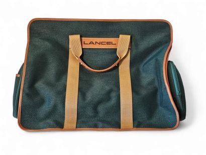 LANCEL
Travel bag in bottle green canvas...