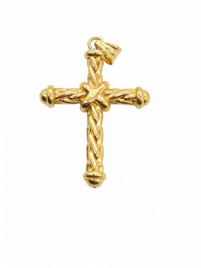 Cross-shaped pendant in 750° yellow gold
Weight...