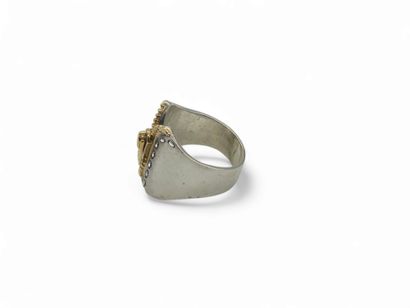 HERMES 
BAGUE en or jaune 750° et argent...