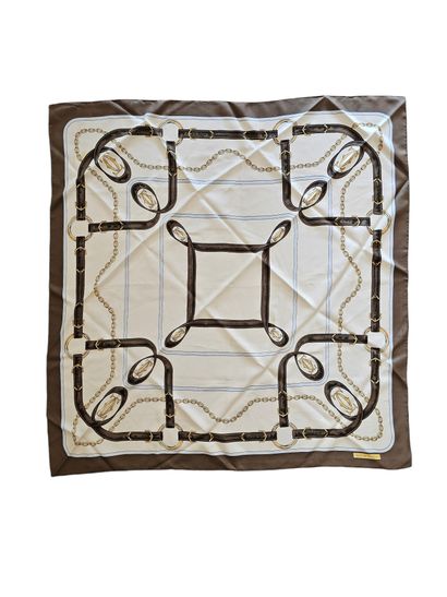 MUST DE CARTIER
Beige silk square on brown...