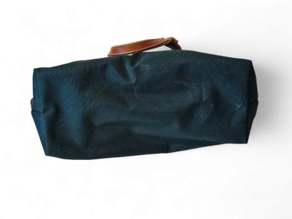 LANCEL
Travel bag in bottle green canvas...