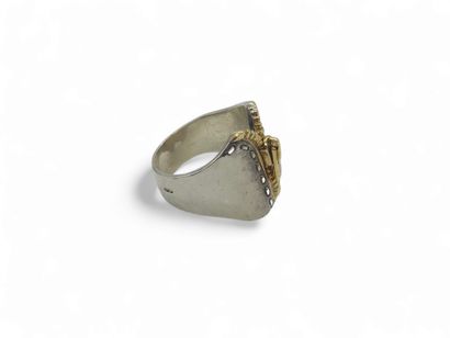 HERMES 
BAGUE en or jaune 750° et argent...