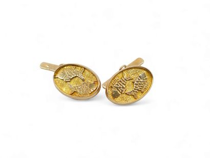 PAIRE de boutons de manchettes en or jaune...