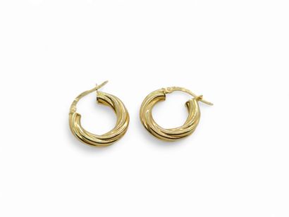 PAIR of twisted hoop earrings in 750° yellow...