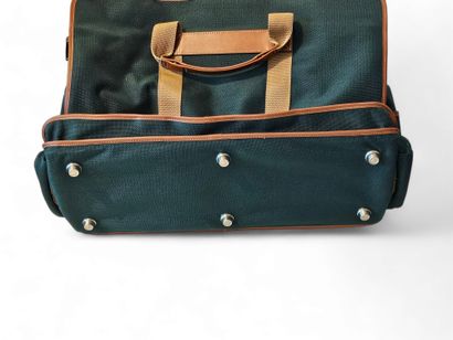 LANCEL
Travel bag in bottle green canvas...