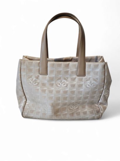 CHANEL 
Beige fabric tote bag
Wear and s...