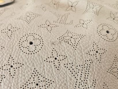 LOUIS VUITTON 
Mahina L model 
Perforated...