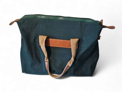 LANCEL
Travel bag in bottle green canvas...