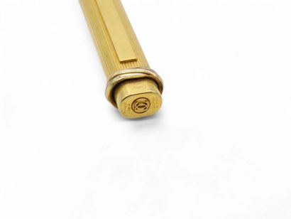 CARTIER
Rollerball pen in gold-plated metal...