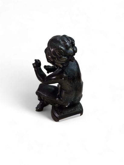 DEUX BRONZES
Un satyre assis, probablement...