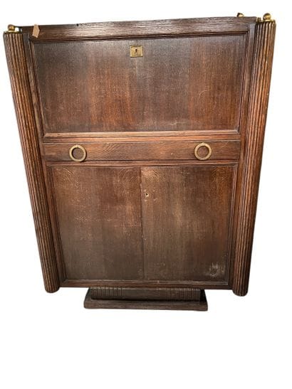 SECRETAIRE en chêne ouvrant par un abattant...