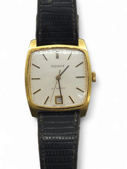 TISSOT
Montre en métal doré, cadran carré,...