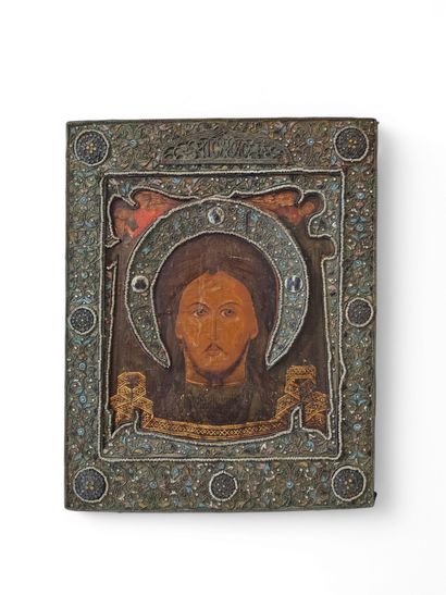 ICONE représentant la Sainte Face tenue par...