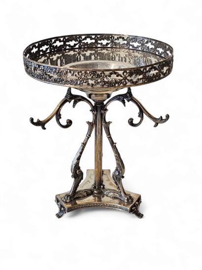 CENTRE DE TABLE TRIPODE reposant sur des...