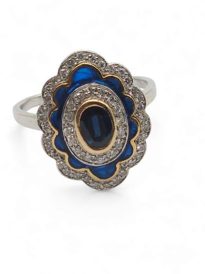 BAGUE en or deux tons 750° sertie d'un saphir...