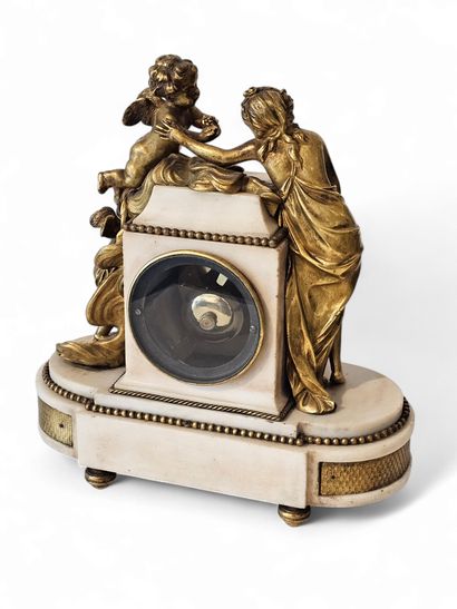 PENDULE de cheminée en marbre et bronze doré,...
