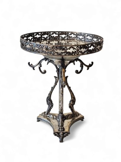 CENTRE DE TABLE TRIPODE reposant sur des...