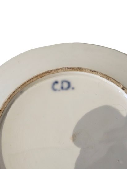 LIMOGES
Ensemble de quatre assiettes en porcelaine...