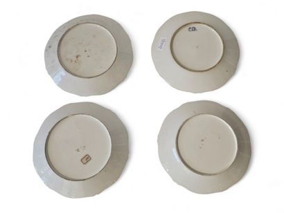 LIMOGES
Ensemble de quatre assiettes en porcelaine...