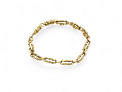 BRACELET en or jaune 750° 
Poids : 19,89...