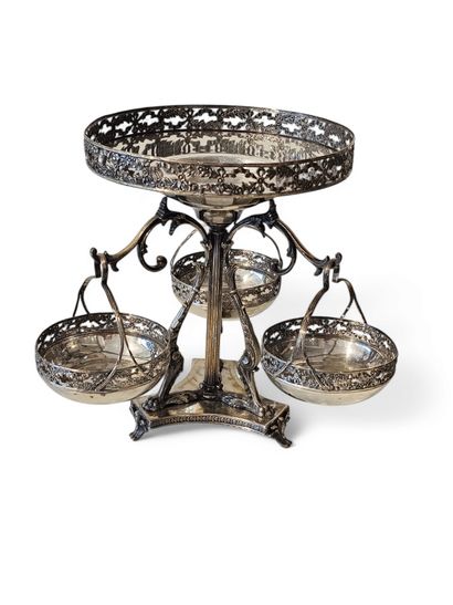 CENTRE DE TABLE TRIPODE reposant sur des...