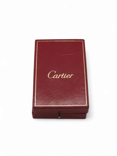 CARTIER
Briquet en métal doré 
Dans sa b...