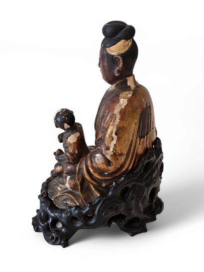 CHINE - XIXe siècle
Groupe en bois sculpté...