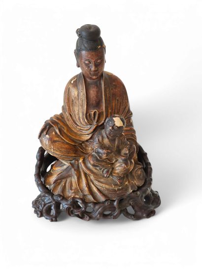 CHINE - XIXe siècle
Groupe en bois sculpté...