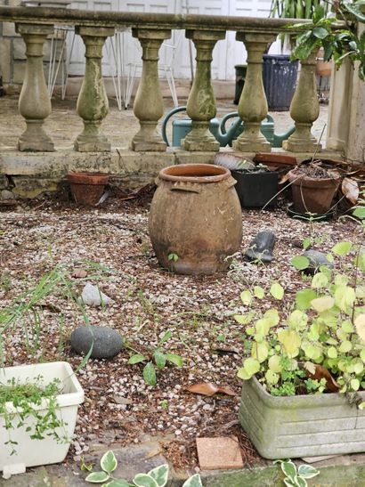In the garden 
Set of damaged terracotta...