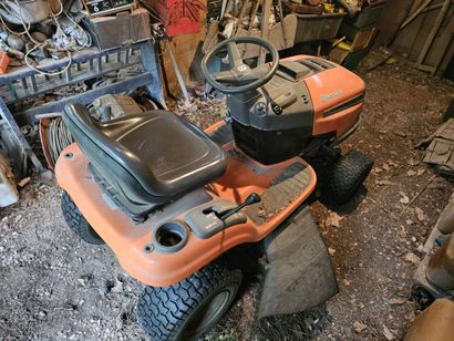 Under a lean-to outside
Husqvarna TS38
Ride-on...
