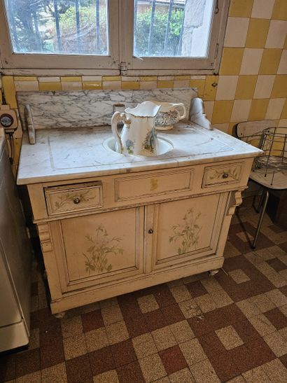 Moulded wood and cream lacquered vanity unit
Marble...