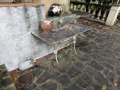 Two wrought-iron bistro tables with damaged...