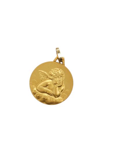 MEDAILLE en or jaune 750° représentant un...