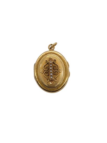 PENDENTIF porte souvenir en or jaune 750°...
