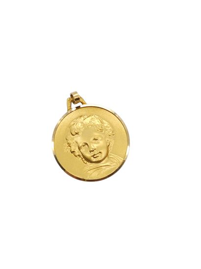 MEDAILLE en or jaune 750° représentant un...