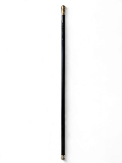 DANDY CANE 20th century
Chased gilded metal...