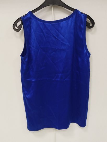 YVES SAINT LAURENT
Blue three-piece suit
Dress,...