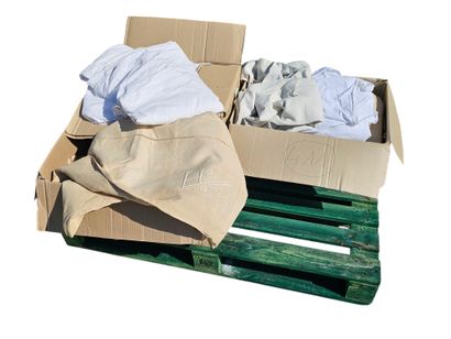 Three boxes of linen and cotton sheets