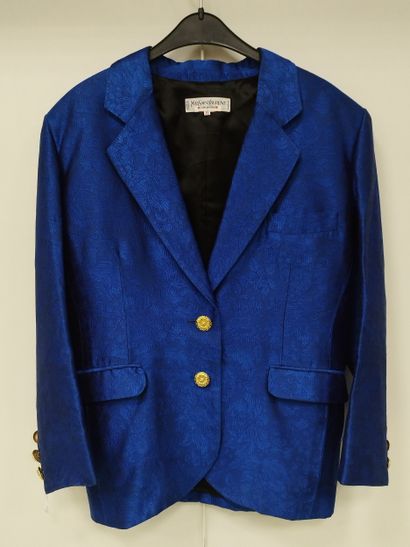 YVES SAINT LAURENT
Blue three-piece suit
Dress,...