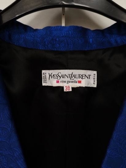 YVES SAINT LAURENT
Blue three-piece suit
Dress,...