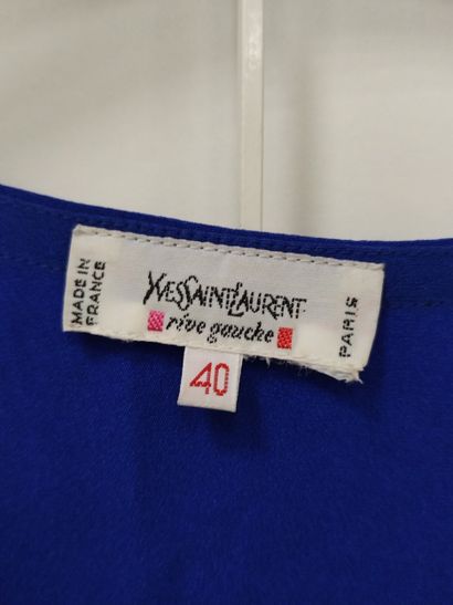 YVES SAINT LAURENT
Blue three-piece suit
Dress,...