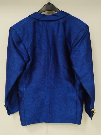 YVES SAINT LAURENT
Blue three-piece suit
Dress,...