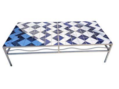 Large wrought iron coffee table with blue...