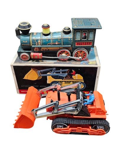 JAPAN
Metal and plastic bulldozer toy with...