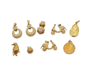 SET OF NINE GOLDEN METAL PENDANTS including
Saint...