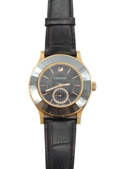 SWAROVSKI
Bracelet watch, round gold-plated...