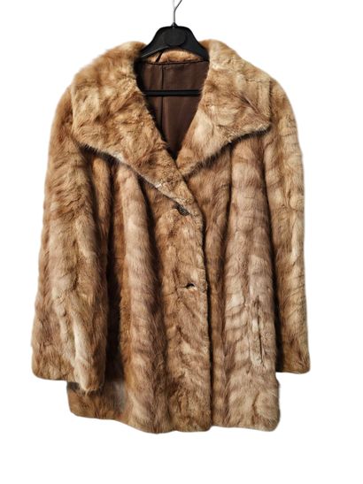 Brown mink coat
With 
An Astrakhan coat