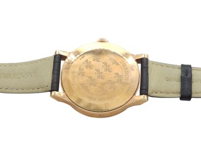SWAROVSKI
Bracelet watch, round gold-plated...